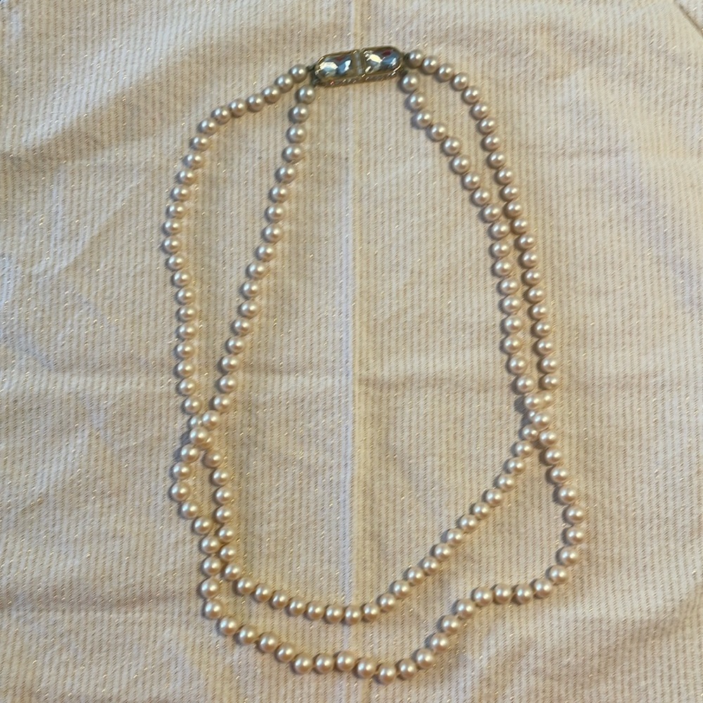 Double strand of pearls with rhinestone clasp